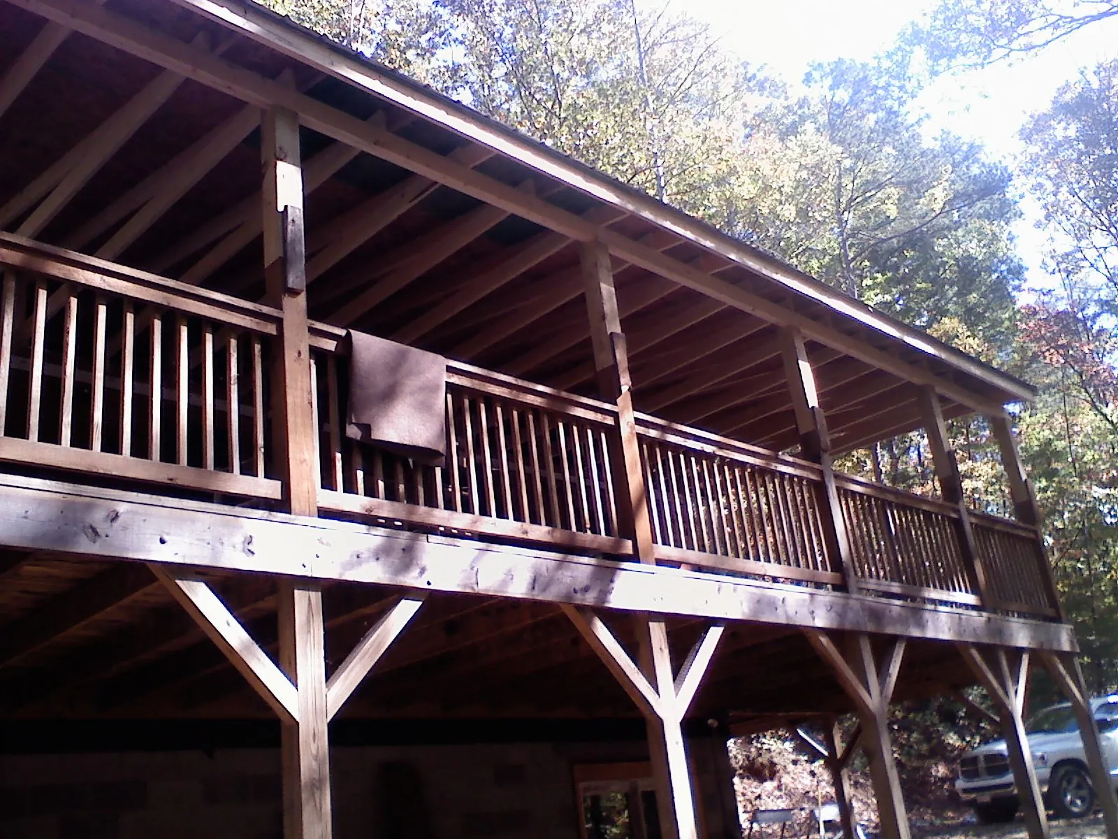 Timber framing under a new elevated porch and deck — Roof Leak Repair in Lonaconing by Roofing Brothers